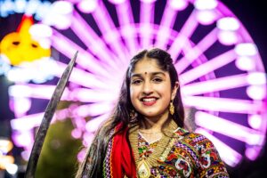indian woman in traditional dress at night