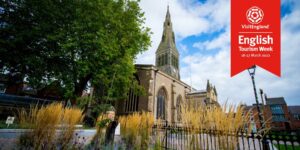 leicester cathedral with a banner that says english tourism week