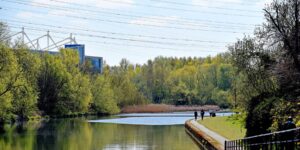 A canal and people walking alongside it