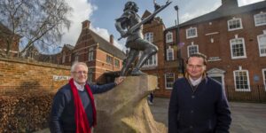 City mayor of leicester and adam clarke in front of the KRIII statue
