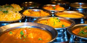 serving dishes full of curry