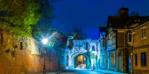 an old english archway on a quaint street