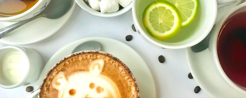a coffee and a tea on a table