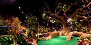 Indoor golf centre with fake trees