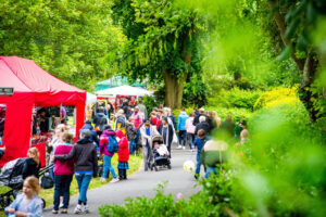 people enjoying an outdoor festival