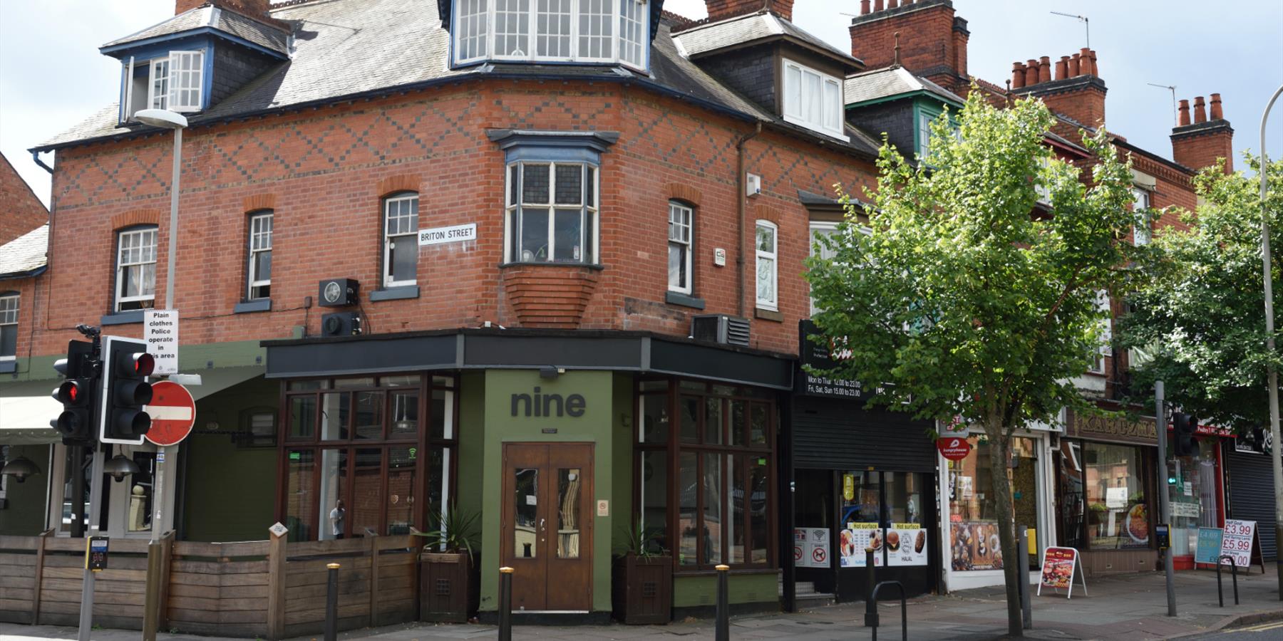 A bar on a street from the exterior