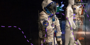 space suits in a display cabinet