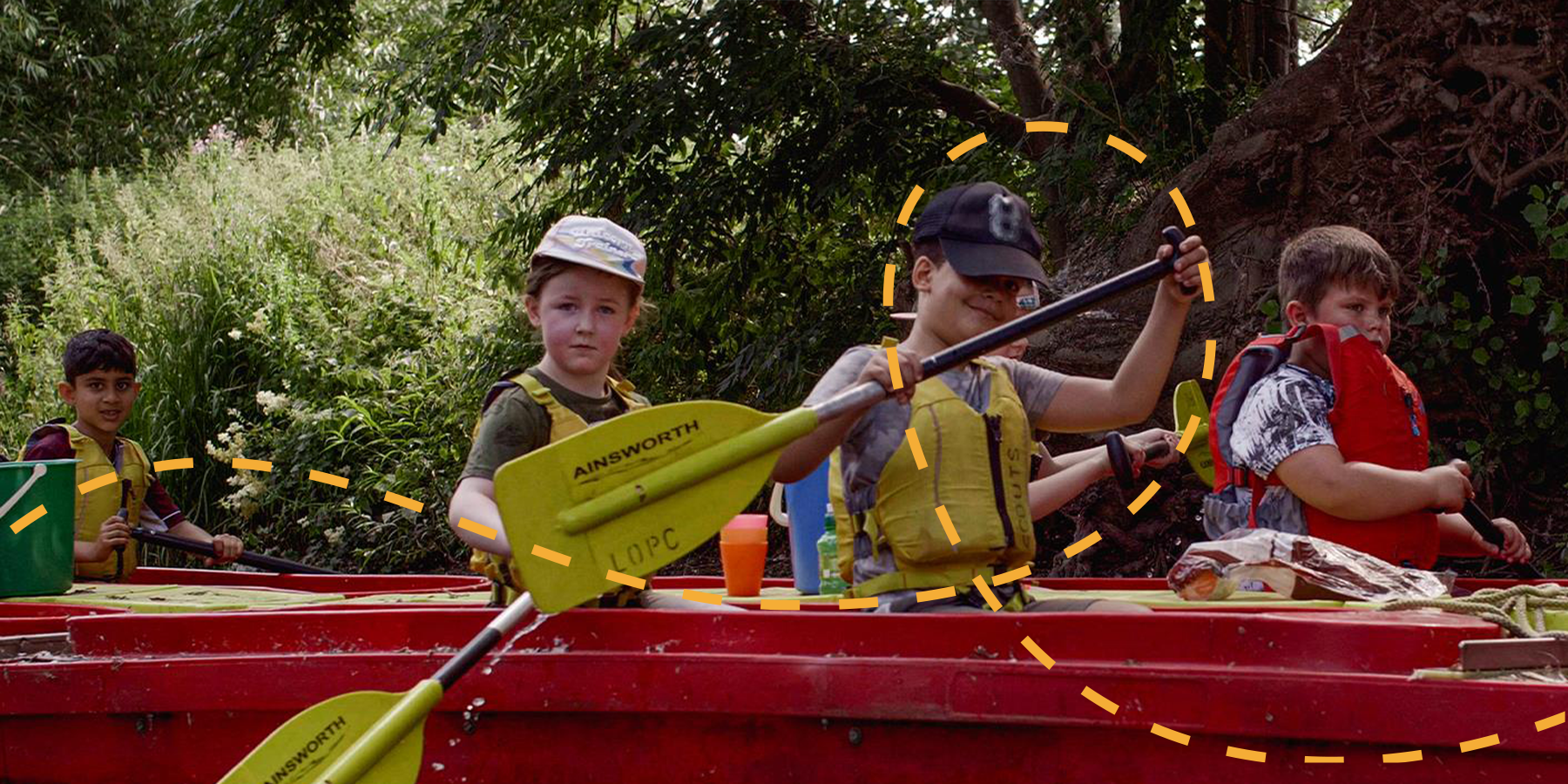 Group of children kayaking