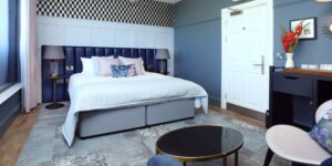 A hotel room with double bed