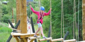 girl on high ropes course