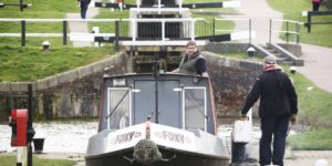 a canal boat traversing the locks at Foxton