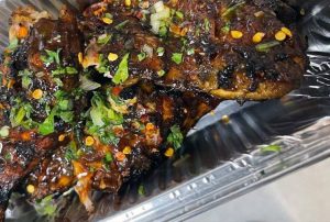 chicken in a takeaway dish