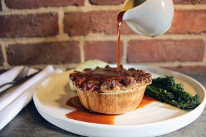pie and gravy on a plate