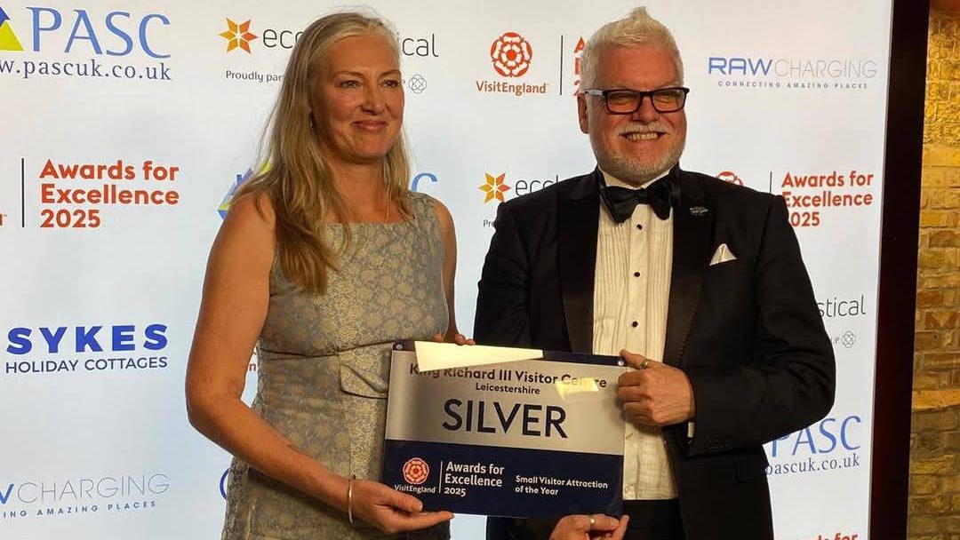 Phil Hackett, General Manager at the King Richard III Visitor Centre and Visit Leicester's Cat Rogers with the Silver Award