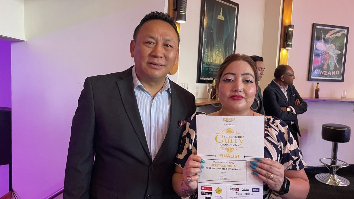 Representatives from Heritage India holding their certificate