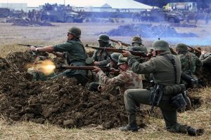 People in uniform at the Victory Show battle recreation