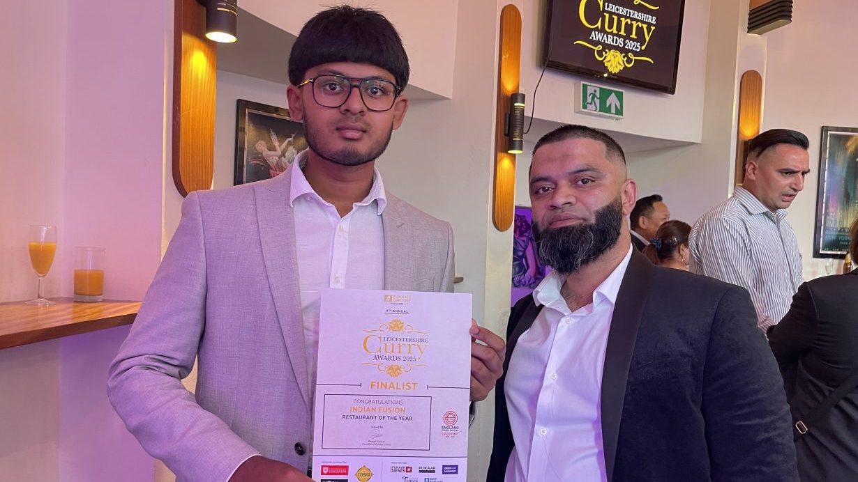 Representatives from Indian Fusion holding their certificate