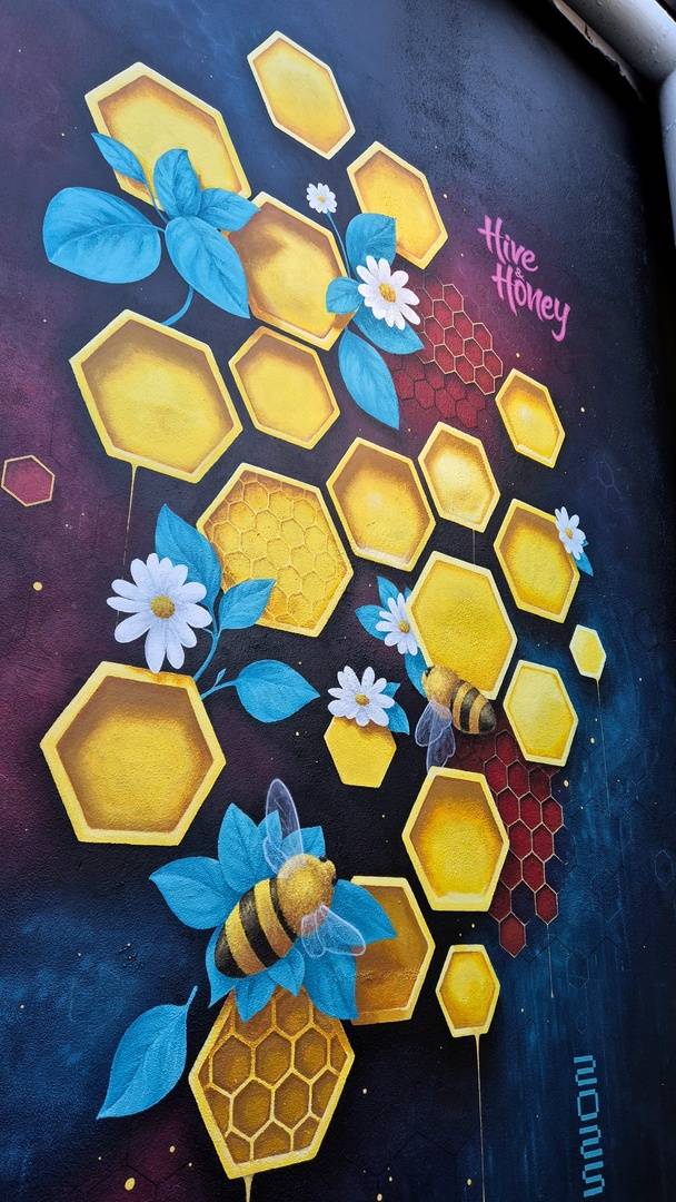 Art work on the wall in hive and honey