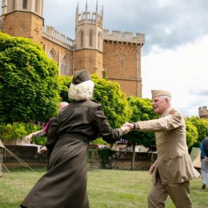 A couple dancing in WWII uniforms