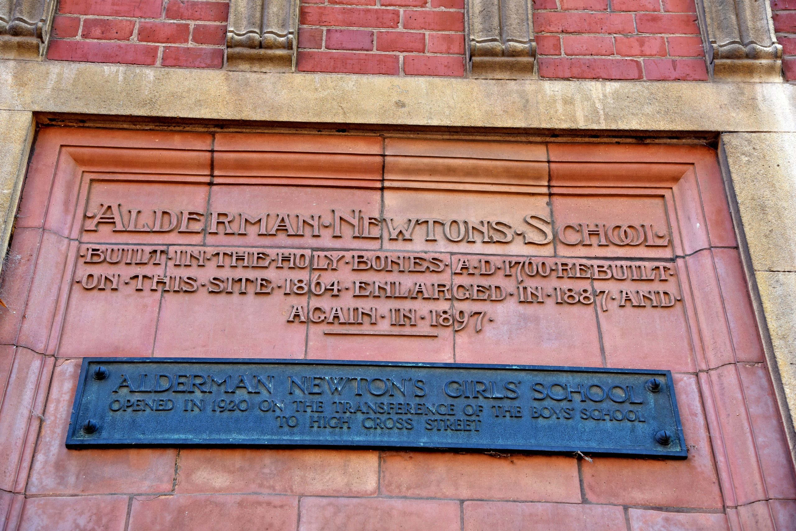 plaque on brickwork of old school