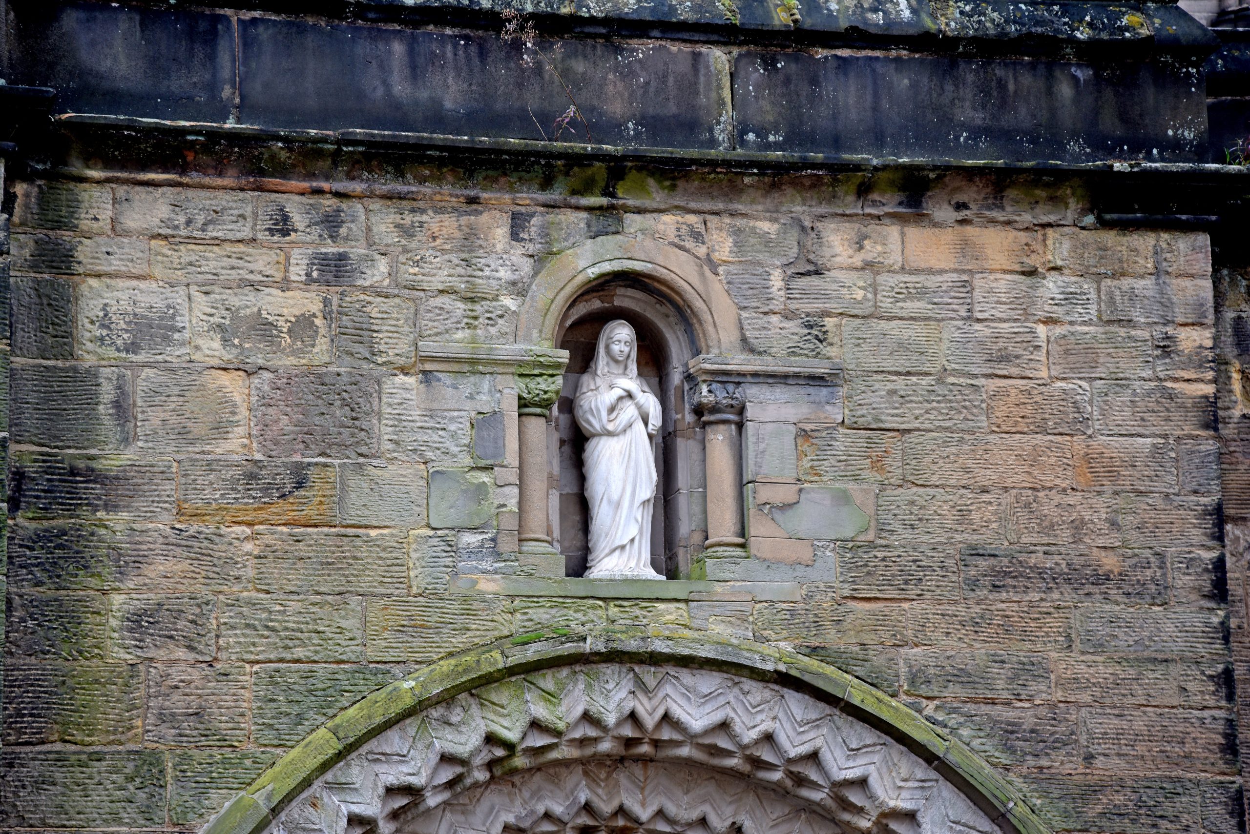 statue above arch