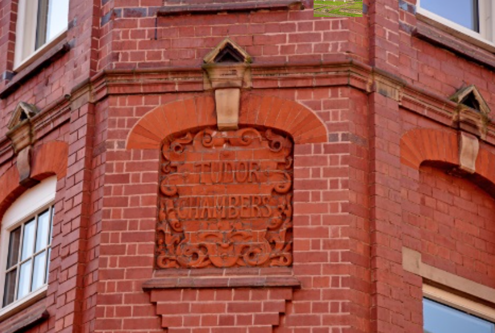 old building with tudor chambers embedded in the brick
