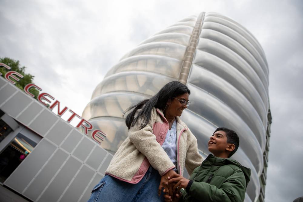 two people stood outside the national space centre