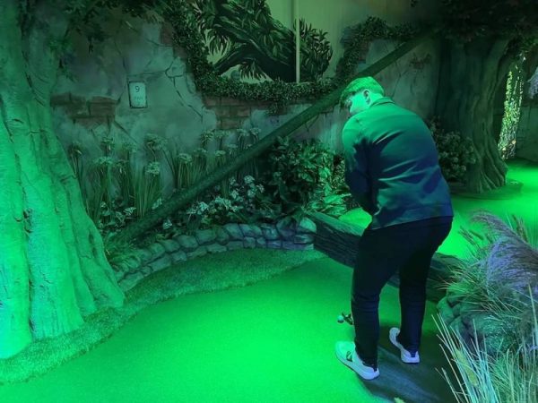 A golfer at Sunnyside Adventure Golf