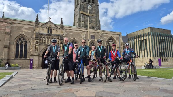 Kings End Way cyclists outside Cathedral